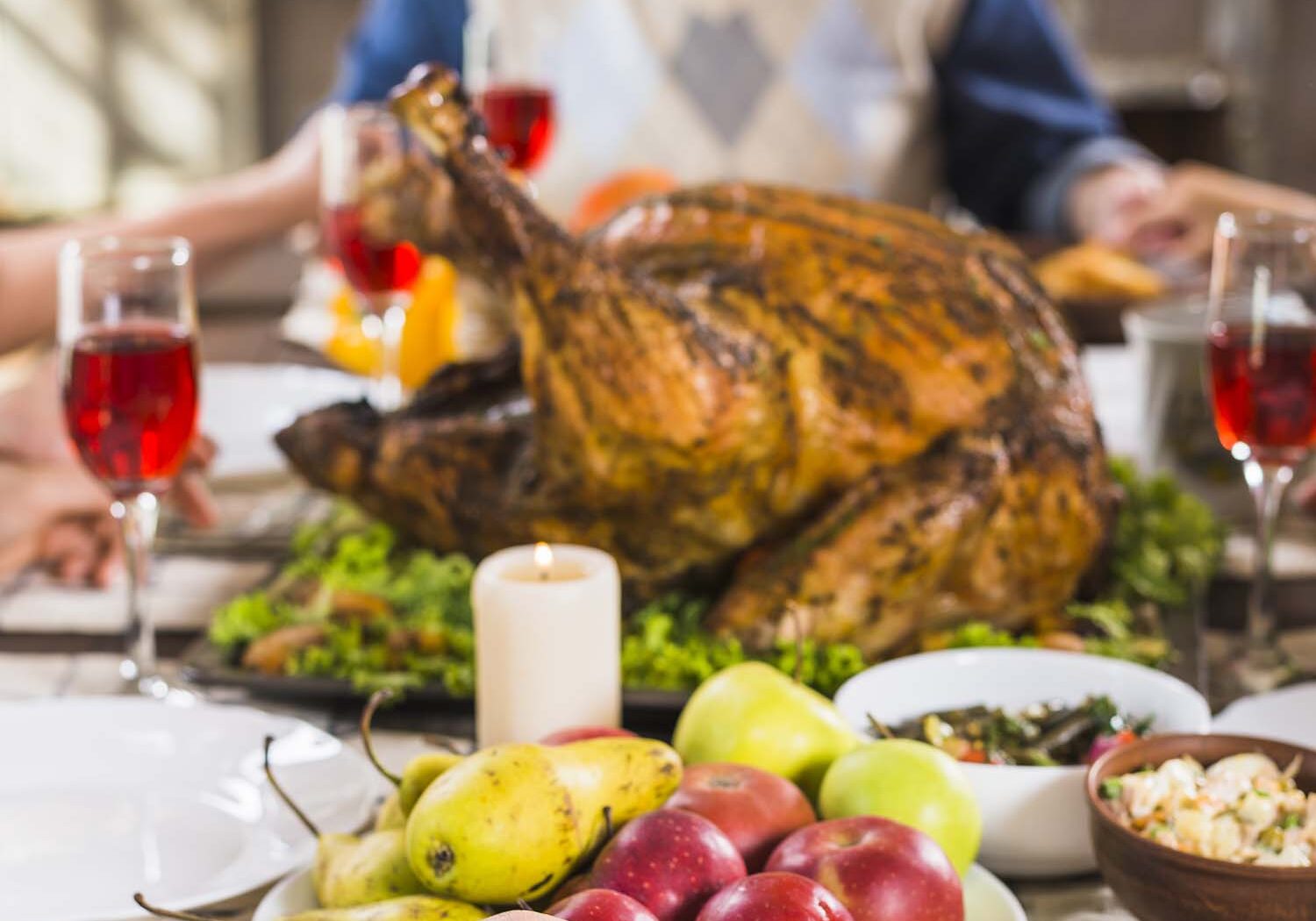 human holding hands table with food near aged man copy